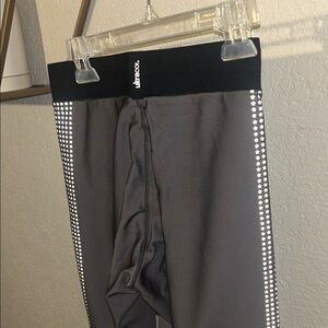 Ultracor Gray Leggings with reflective stars on side